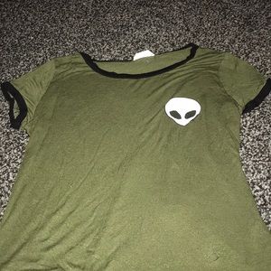 An alien green short sleeve with black out lining